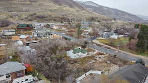 Aerial view of residential area with a mountainous background