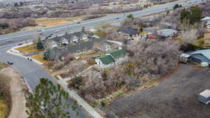 View of property location with nearby suburban area