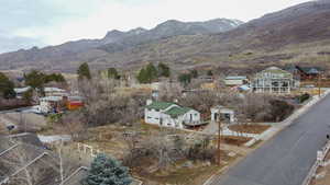 View of mountain backdrop with nearby suburban area