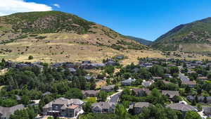Aerial view of residential area with a mountainous background