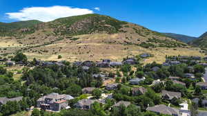 Aerial view of residential area with mountains