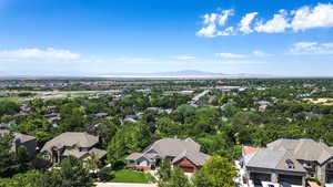 Aerial view of residential area with a mountainous background