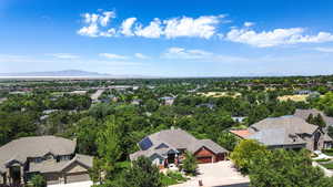 Aerial view of residential area featuring a mountain backdrop
