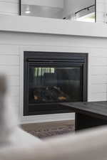 Detailed view of a glass covered fireplace