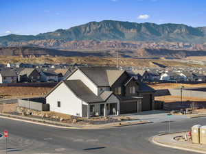 View of mountain backdrop with nearby suburban area