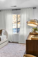 Interior space featuring carpet