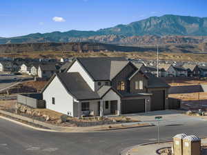 Mountain view featuring nearby suburban area