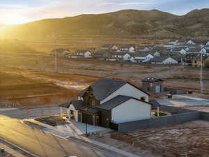 Aerial view of residential area featuring a mountain backdrop