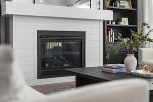 Detailed view of a glass covered fireplace