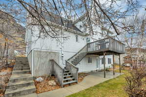 Cement stairway around to the basement apartment entrance