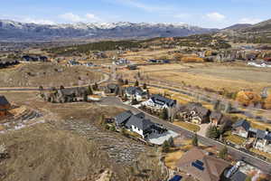 View of property location with nearby suburban area and a mountainous background