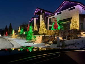 View of property at twilight