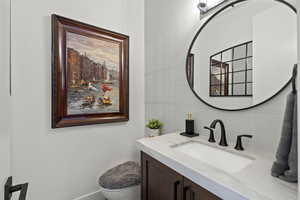 Bathroom with vanity and toilet