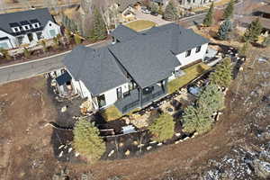 Aerial overview of property's location featuring nearby suburban area