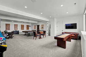 Game room featuring light carpet and recessed lighting