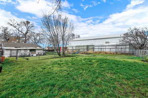 View of fenced backyard