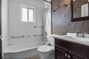 Full bathroom with vanity and tub / shower combination