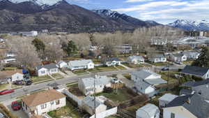 Aerial perspective of suburban area featuring a mountainous background