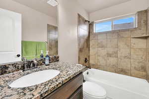 Full bathroom with vanity and shower / bath combination