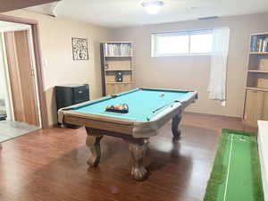 Recreation room featuring billiards and wood finished floors