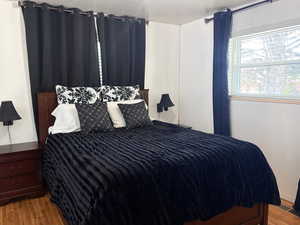 Bedroom featuring wood finished floors