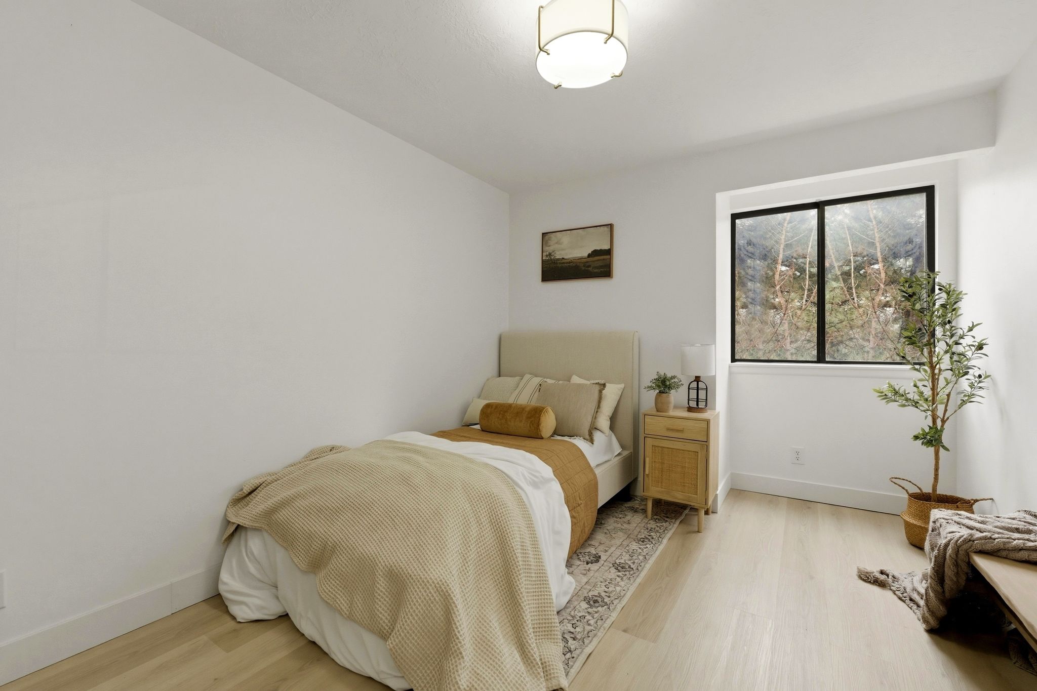 Bedroom featuring light wood-style floors