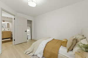 Bedroom with light wood-type flooring