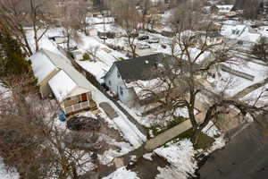Snowy aerial view with a residential view