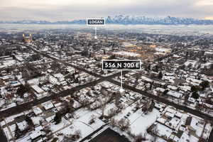 Snowy aerial view with a mountain view