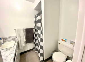 Bathroom with vanity and a shower with curtain