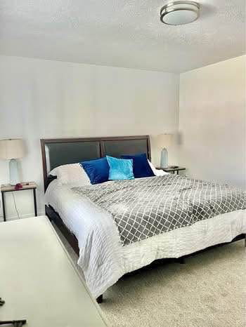 Bedroom featuring a textured ceiling