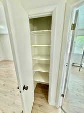 Closet with baseboard heating