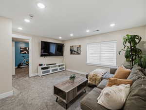 Family room featuring carpet flooring,  recessed lighting and blinds