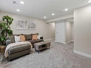 Family room featuring carpet flooring,  recessed lighting and blinds