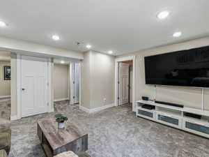 Family room featuring carpet flooring,  recessed lighting and blinds