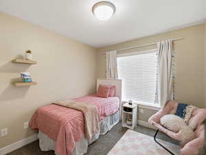 Bedroom with blinds, carpet and french door wide closet