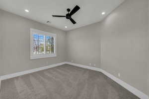 Empty room with ceiling fan, carpet, and recessed lighting