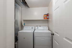 Laundry area featuring independent washer and dryer