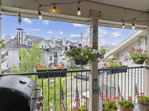 Balcony with a grill and a residential view