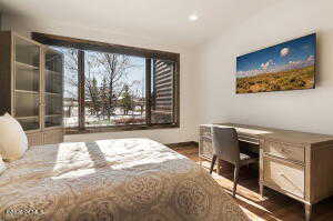 Bedroom featuring recessed lighting and wood finished floors