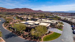 Aerial view of residential area featuring a mountainous background
