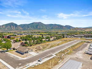 View of mountain background featuring nearby suburban area