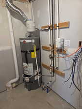 Utilities featuring strapped water heater