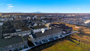 Aerial view of residential area with a mountainous background