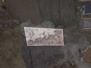 Aerial view of property's location featuring property parcel outlined