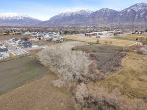 View of mountain background featuring nearby suburban area