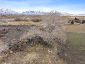 View of mountain backdrop featuring rural landscape