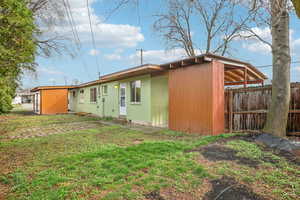 Back of property with entry steps