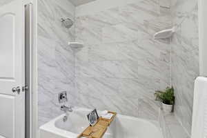 Primary Bathroom with shower / tub combination