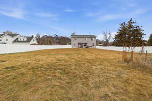 View of fenced backyard
